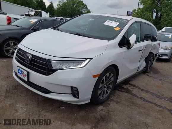 2023 Honda Odyssey EX-L with VIN 5FNRL6H6XPB055979, listed as a IAAI auction lot 42443479 with 61,873 mi miles and . Bid and sale history available at DreamBid. Image 2.