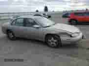 1999 Chevrolet Lumina LTZ с VIN 2G1WN52K6X9190614, выставлен на аукционе Copart как лот 72433904 с пробегом 240 984 миль миль и Списание • Salvage title. История ставок и продаж доступна на DreamBid. Изображение 4.