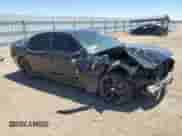 2014 Dodge Charger RT Max with VIN 2C3CDXCT6EH322357, listed as a Copart auction lot 54954995 with 149,650 mi miles and Salvage title. Bid and sale history available at DreamBid. Image 4.