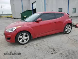 2013 Hyundai Veloster w/Black Int z VIN KMHTC6AD9DU093846, wystawiony jako Copart lot #59692295 z przebiegiem 179 707 mil mil oraz Szkoda całkowita • Salvage title. Historia ofert i sprzedaży dostępna na DreamBid. Obrazek 1.