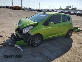 2015 Chevrolet Spark LS with VIN KL8CB6S97FC797935, listed as a Copart auction lot 85173805 with 156,645 mi miles and Salvage title. Bid and sale history available at DreamBid. Image 1.