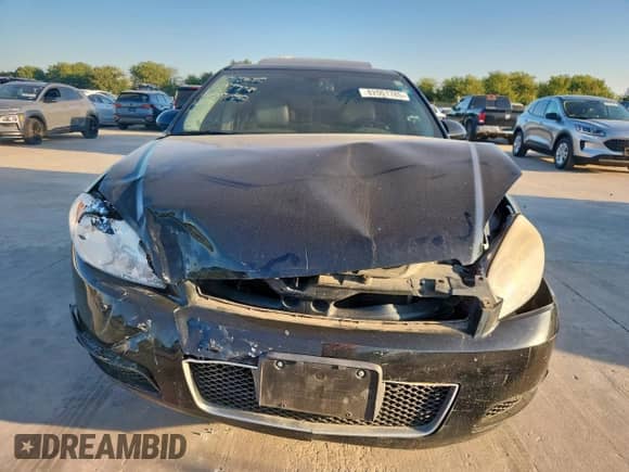 2012 Chevrolet Impala LTZ with VIN 2G1WC5E35C1257576, listed as a Copart auction lot 82001785 with 174,047 mi miles and Salvage title. Bid and sale history available at DreamBid. Image 5.