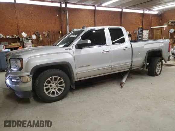2018 GMC Sierra 1500 SLE с VIN 1GTV2MEC1JZ245395, выставлен на аукционе Copart как лот 70380975 с пробегом 89 845 миль миль и Списание • Salvage title. История ставок и продаж доступна на DreamBid. Изображение 1.