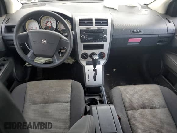 2009 Dodge Caliber SXT with VIN 1B3HB48A89D224125, listed as a Copart auction lot 61968005 with 241,959 mi miles and Salvage title. Bid and sale history available at DreamBid. Image 8.