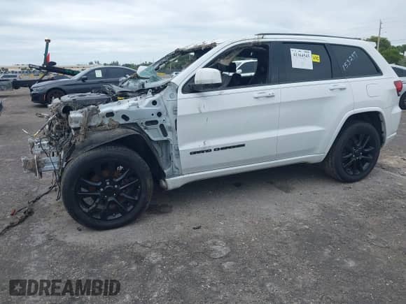 2018 Jeep Grand Cherokee Laredo E with VIN 1C4RJEAG4JC153297, listed as a IAAI auction lot 41364545 with Not provided miles and . Bid and sale history available at DreamBid. Image 2.
