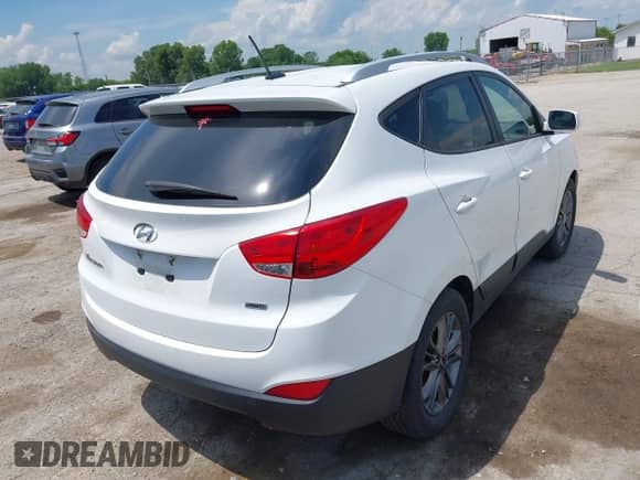 2014 Hyundai Tucson Limited z VIN KM8JUCAG3EU906614, wystawiony jako IAAI lot #42578113 z przebiegiem 84 512 mil mil oraz . Historia ofert i sprzedaży dostępna na DreamBid. Obrazek 4.