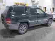 1995 Jeep Grand Cherokee Laredo с VIN 1J4GZ58S6SC765863, выставлен на аукционе IAAI как лот 41797726 с пробегом 234 715 миль миль и . История ставок и продаж доступна на DreamBid. Изображение 4.