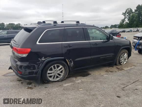 2017 Jeep Grand Cherokee Laredo with VIN 1C4RJEAG4HC656614, listed as a Copart auction lot 67652725 with 144,430 mi miles and Salvage title. Bid and sale history available at DreamBid. Image 3.