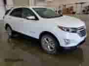 2021 Chevrolet Equinox Premier с VIN 2GNAXXEV3M6141078, выставлен на аукционе Copart как лот 70060565 с пробегом 136 551 миль миль и Списание • Salvage title. История ставок и продаж доступна на DreamBid. Изображение 4.