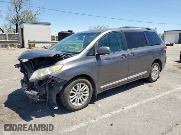 2011 Toyota Sienna XLE AAS with VIN 5TDYK3DC9BS147193, listed as a Copart auction lot 66310535 with 208,252 mi miles and Salvage title. Bid and sale history available at DreamBid. Image 1.