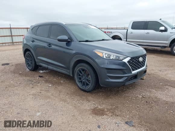 2019 Hyundai Tucson Value z VIN KM8J3CA40KU984658, wystawiony jako IAAI lot #42333417 z przebiegiem 94 183 mil mil oraz . Historia ofert i sprzedaży dostępna na DreamBid. Obrazek 1.