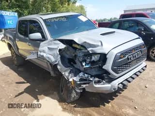 2020 Toyota Tacoma SR5 with VIN 3TMCZ5AN3LM338116, listed as a IAAI auction lot 43146582 with 55,269 mi miles and . Bid and sale history available at DreamBid. Image 1.