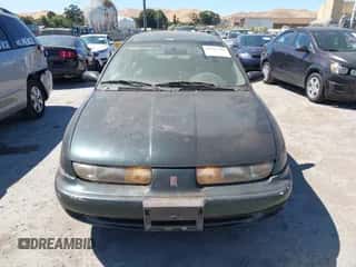 1998 Saturn SW with VIN 1G8ZJ8273WZ271873, listed as a IAAI auction lot 42686240 with 112,938 mi miles and . Bid and sale history available at DreamBid. Image 6.