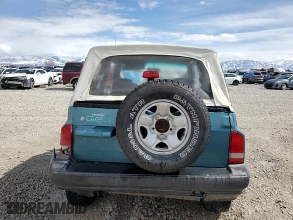 1996 Chevrolet Tracker с VIN 2CNBJ1869T6903615, выставлен на аукционе Copart как лот 49690055 с пробегом 144 821 миль миль и Списание • Salvage title. История ставок и продаж доступна на DreamBid. Изображение 6.