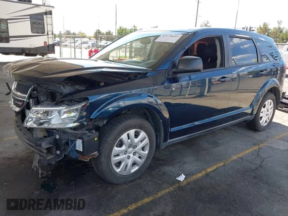 2015 Dodge Journey SE with VIN 3C4PDCAB8FT587824, listed as a IAAI auction lot 43270692 with 123,419 mi miles and . Bid and sale history available at DreamBid. Image 2.