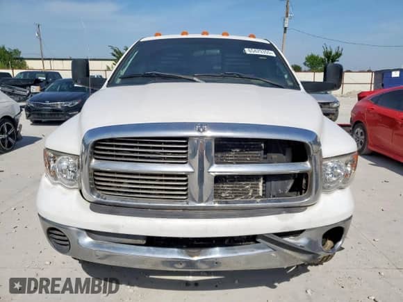 2004 Dodge 3500 SLT с VIN 3D7MA48C34G113128, выставлен на аукционе Copart как лот 65429355 с пробегом 286 594 миль миль и Списание • Salvage title. История ставок и продаж доступна на DreamBid. Изображение 5.