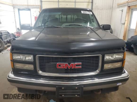 1995 GMC Sierra 1500 with VIN 1GTEK19K3SE548039, listed as a Copart auction lot 58201755 with 124,841 mi miles and Clean title. Bid and sale history available at DreamBid. Image 5.