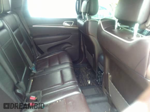 2018 Jeep Grand Cherokee Overland with VIN 1C4RJFCG0JC326025, listed as a IAAI auction lot 42387079 with 182,046 mi miles and . Bid and sale history available at DreamBid. Image 8.