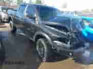 2018 Ram 1500 Rebel with VIN 1C6RR7YTXJS112242, listed as a IAAI auction lot 41664252 with 147,630 mi miles and . Bid and sale history available at DreamBid. Image 1.