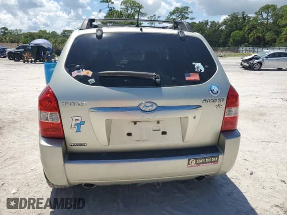 2007 Hyundai Tucson SE with VIN KM8JN12DX7U585485, listed as a Copart auction lot 69062935 with 162,217 mi miles and Salvage title. Bid and sale history available at DreamBid. Image 6.