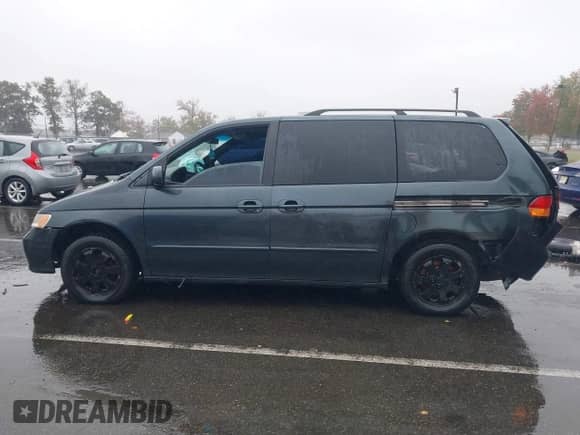 2003 Honda Odyssey EX z VIN 5FNRL18603B054627, wystawiony jako IAAI lot #43413800 z przebiegiem 201 434 mil mil oraz . Historia ofert i sprzedaży dostępna na DreamBid. Obrazek 13.