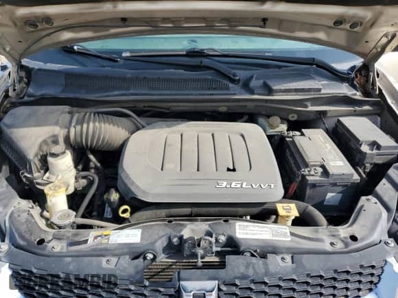 2015 Dodge Grand Caravan American Value with VIN 2C4RDGBG0FR616455, listed as a Copart auction lot 69191805 with 190,478 mi miles and Salvage title. Bid and sale history available at DreamBid. Image 12.
