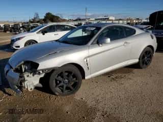 2006 Hyundai Tiburon GT с VIN KMHHN65F26U209337, выставлен на аукционе Copart как лот 85268614 с пробегом 110 955 миль миль и Списание • Salvage title. История ставок и продаж доступна на DreamBid. Изображение 1.