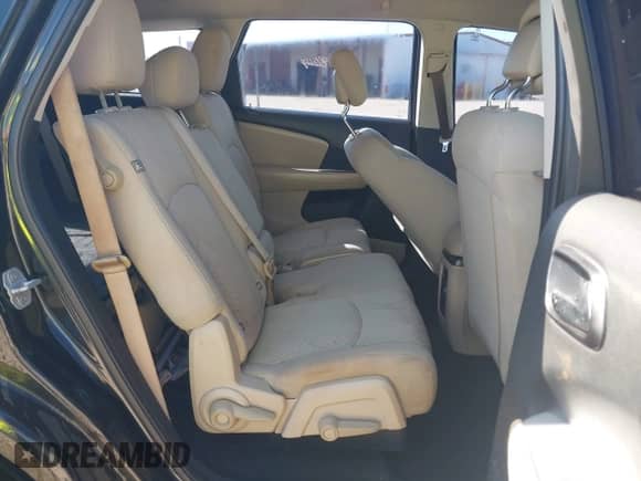 2012 Dodge Journey American Value z VIN 3C4PDCAB2CT296554, wystawiony jako IAAI lot #42711875 z przebiegiem 193 921 mil mil oraz . Historia ofert i sprzedaży dostępna na DreamBid. Obrazek 8.