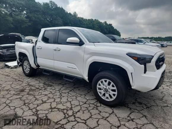 2024 Toyota Tacoma SR5 with VIN 3TYLB5JN2RT035281, listed as a Copart auction lot 69350095 with 9,907 mi miles and Salvage title. Bid and sale history available at DreamBid. Image 4.