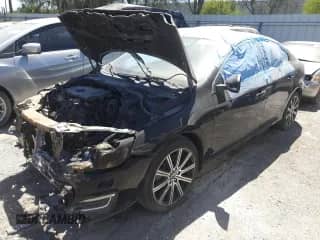 2015 Volvo S60 T6 Drive-E с VIN YV149MFK4F2336717, выставлен на аукционе Copart как лот 51391435 с пробегом Не указан миль и Списание • Salvage title. История ставок и продаж доступна на DreamBid. Изображение 1.