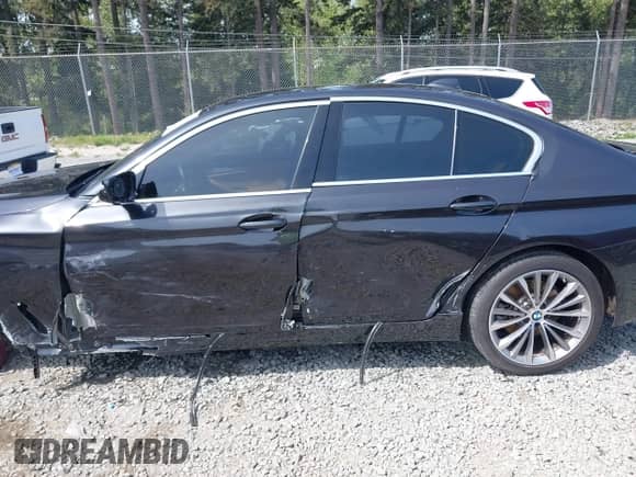 2022 BMW 5 Series 530i xDrive with VIN WBA13BJ09NWX51234, listed as a IAAI auction lot 42106974 with 26,480 mi miles and . Bid and sale history available at DreamBid. Image 14.