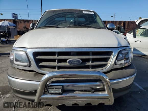 2002 Ford F-150 XLT с VIN 1FTRW07L52KA32293, выставлен на аукционе Copart как лот 81226245 с пробегом 472 017 миль миль и Списание • Salvage title. История ставок и продаж доступна на DreamBid. Изображение 5.