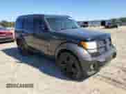 2011 Dodge Nitro Heat z VIN 1D4PT4GK5BW589795, wystawiony jako Copart lot #70257423 z przebiegiem 140 599 mil mil oraz Szkoda całkowita • Salvage title. Historia ofert i sprzedaży dostępna na DreamBid. Obrazek 4.