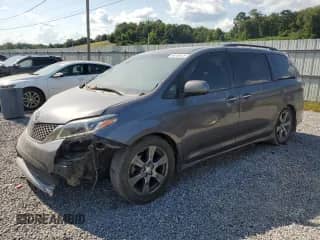 2017 Toyota Sienna SE with VIN 5TDXZ3DC6HS783909, listed as a Copart auction lot 68199575 with 183,031 mi miles and Salvage title. Bid and sale history available at DreamBid. Image 1.