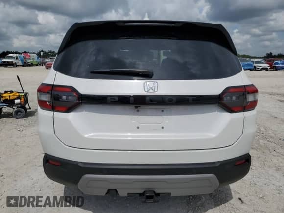 2025 Honda Pilot EX-L с VIN 5FNYG2H41SB016620, выставлен на аукционе Copart как лот 66487725 с пробегом 19 504 миль миль и Списание • Salvage title. История ставок и продаж доступна на DreamBid. Изображение 6.