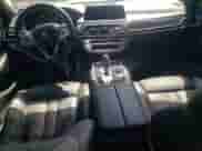 2019 BMW 7 Series 750i with VIN WBA7F0C55KGM24513, listed as a Copart auction lot 61728595 with 26,303 mi miles and Salvage title. Bid and sale history available at DreamBid. Image 8.