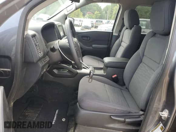 2023 Nissan Frontier S with VIN 1N6ED1EK0PN636339, listed as a Copart auction lot 70015045 with 72,172 mi miles and Salvage title. Bid and sale history available at DreamBid. Image 7.