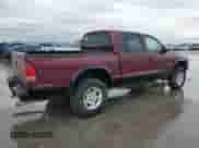2002 Dodge Dakota SLT z VIN 1B7HG48N32S615218, wystawiony jako Copart lot #46933895 z przebiegiem Nie podano mil oraz Szkoda całkowita • Salvage title. Historia ofert i sprzedaży dostępna na DreamBid. Obrazek 3.