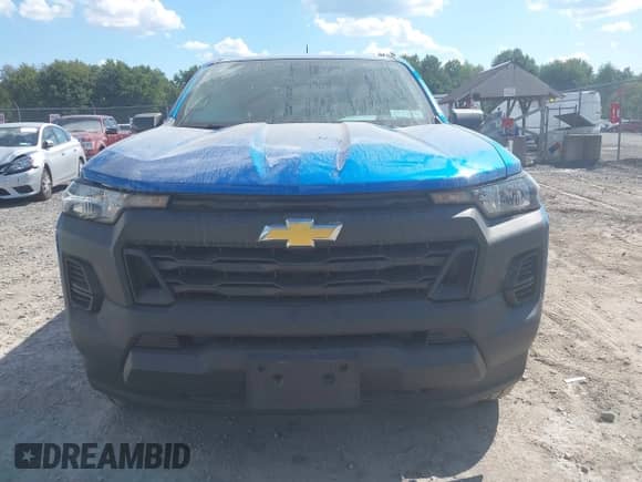 2023 Chevrolet Colorado 4WD Work Truck z VIN 1GCGTBEC8P1131668, wystawiony jako IAAI lot #43142653 z przebiegiem 30 405 mil mil oraz . Historia ofert i sprzedaży dostępna na DreamBid. Obrazek 12.