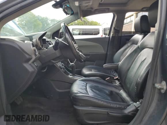 2013 Chevrolet Sonic LTZ with VIN 1G1JE6SB0D4104549, listed as a Copart auction lot 82157005 with 195,547 mi miles and Clean title. Bid and sale history available at DreamBid. Image 7.
