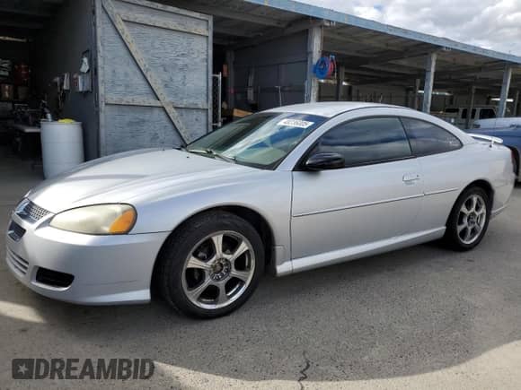 2003 Dodge Stratus SE z VIN 4B3AG42G33E173455, wystawiony jako Copart lot #48236005 z przebiegiem 188 411 mil mil oraz Szkoda całkowita • Salvage title. Historia ofert i sprzedaży dostępna na DreamBid. Obrazek 1.