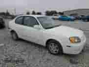 2004 Hyundai Accent GL z VIN KMHCG35C14U311640, wystawiony jako Copart lot #78511284 z przebiegiem 175 004 mil mil oraz Szkoda całkowita • Salvage title. Historia ofert i sprzedaży dostępna na DreamBid. Obrazek 4.