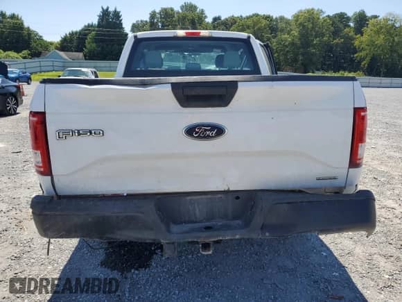 2015 Ford F-150 XLT with VIN 1FTEX1E84FFC66732, listed as a Copart auction lot 71565965 with 190,871 mi miles and Salvage title. Bid and sale history available at DreamBid. Image 6.