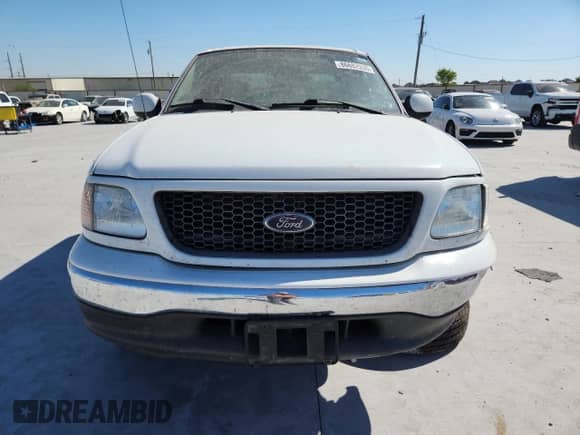 2003 Ford F-150 XL z VIN 2FTRX17L63CB07124, wystawiony jako Copart lot #86682935 z przebiegiem 101 788 mil mil oraz Szkoda całkowita • Salvage title. Historia ofert i sprzedaży dostępna na DreamBid. Obrazek 5.