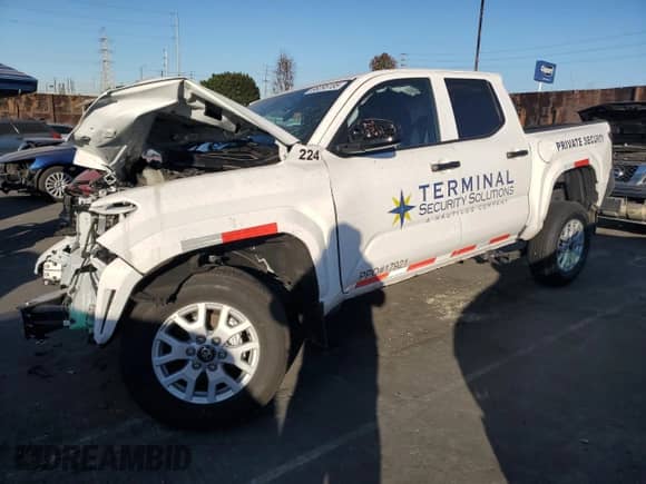 2024 Toyota Tacoma SR with VIN 3TYKD5HN9RT002032, listed as a Copart auction lot 88295185 with 6,144 mi miles and Salvage title. Bid and sale history available at DreamBid. Image 1.