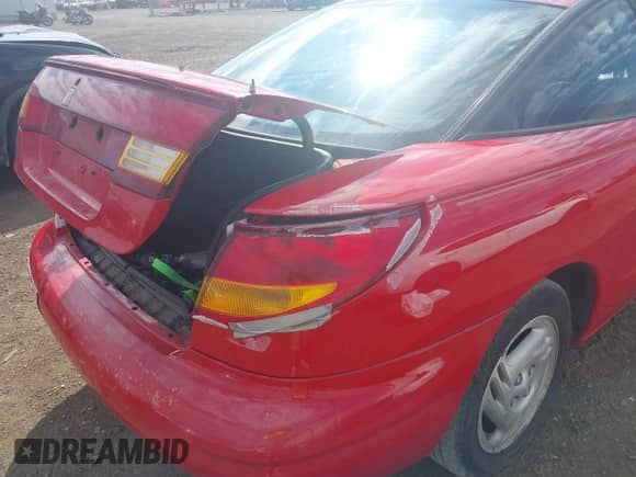 1997 Saturn 2dr Coupe with VIN 1G8ZH1272VZ206904, listed as a IAAI auction lot 43012660 with 159,456 mi miles and . Bid and sale history available at DreamBid. Image 12.
