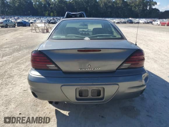 2003 Pontiac Grand Am SE с VIN 1G2NE52F03C159100, выставлен на аукционе Copart как лот 81825105 с пробегом 96 125 миль миль и Списание • Salvage title. История ставок и продаж доступна на DreamBid. Изображение 6.