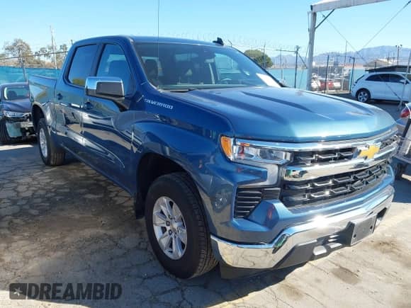 2024 Chevrolet Silverado 1500 LT with VIN 3GCPACEK1RG173476, listed as a IAAI auction lot 43450587 with 19,972 mi miles and . Bid and sale history available at DreamBid. Image 1.