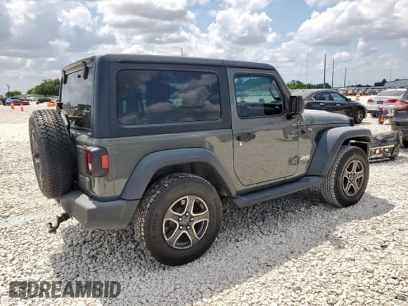 2018 Jeep Wrangler Sport with VIN 1C4GJXAG5JW303631, listed as a Copart auction lot 69999165 with 106,170 mi miles and Salvage title. Bid and sale history available at DreamBid. Image 3.