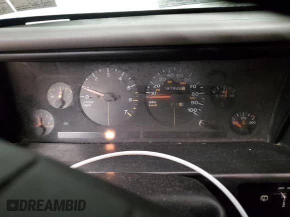 1995 Jeep Grand Cherokee Laredo with VIN 1J4GZ58S6SC630947, listed as a Copart auction lot 82143564 with 267,946 mi miles and Salvage title. Bid and sale history available at DreamBid. Image 9.